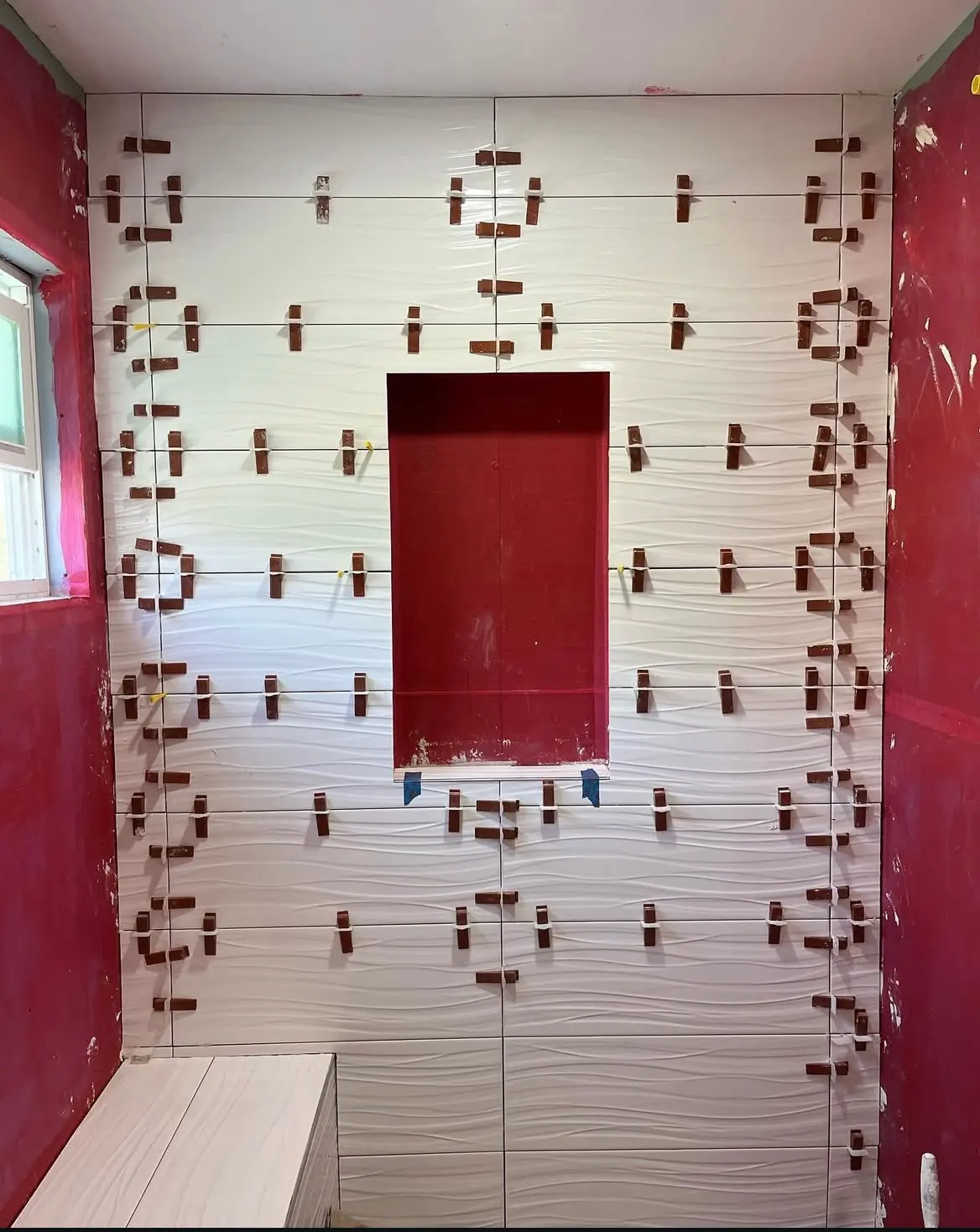 Wave tile being set in Orlando shower